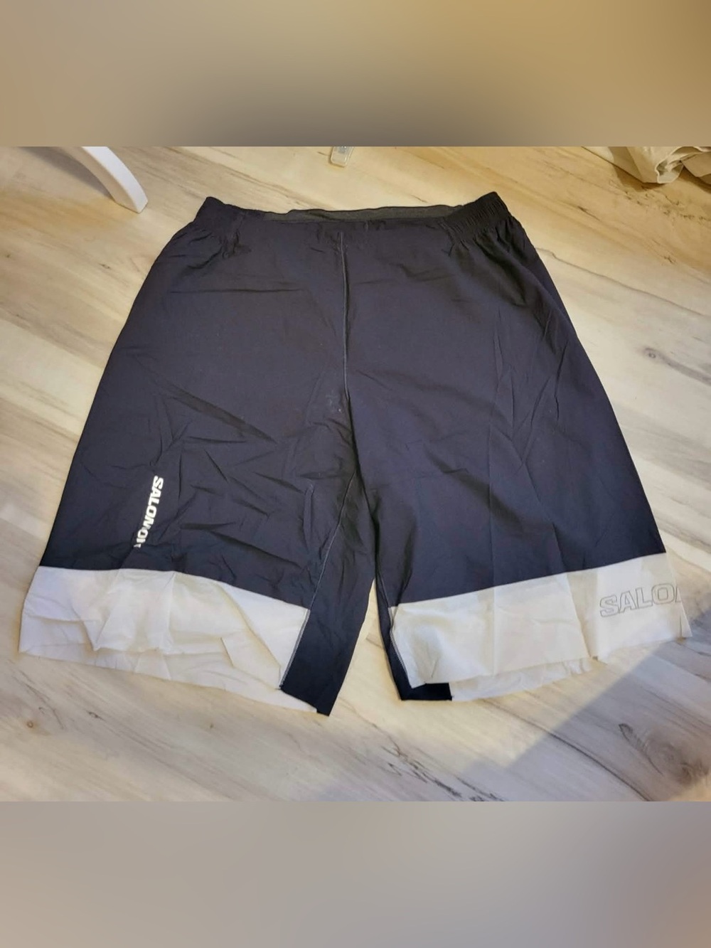 Salomon Men's Black Shorts with White Hem Accent
